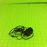 26-006010-000-100 U060020D12 6V 200MA Power Adapter Cord. Fixed Price $13.95.