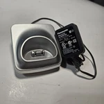 Panasonic Silver Charging Base Cradle W/ PNLV233 Adapter. Fixed Price $12.00.