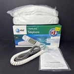 At&t ML210W Corded Trimline Phone With Lighted Keypad (white). Fixed Price $34.00.