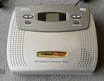 On-hold Plus OHP6000 Silver/white ( 128 Mb ) Digital Media Player. Fixed Price $25.00.